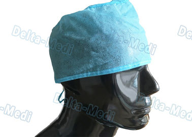 Los casquillos quirúrgicos disponibles hechos a mano azules de los PP, médico friegan los casquillos 15 - 35gsm